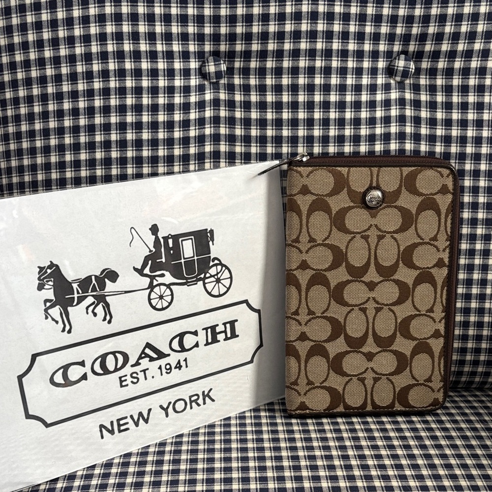 Coach Brown and Cream Signature C journal holder